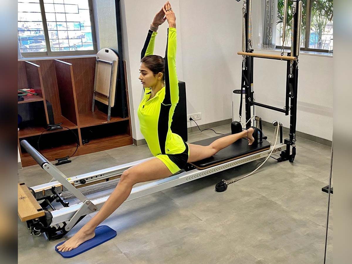  Pooja Hegde stretches her legs