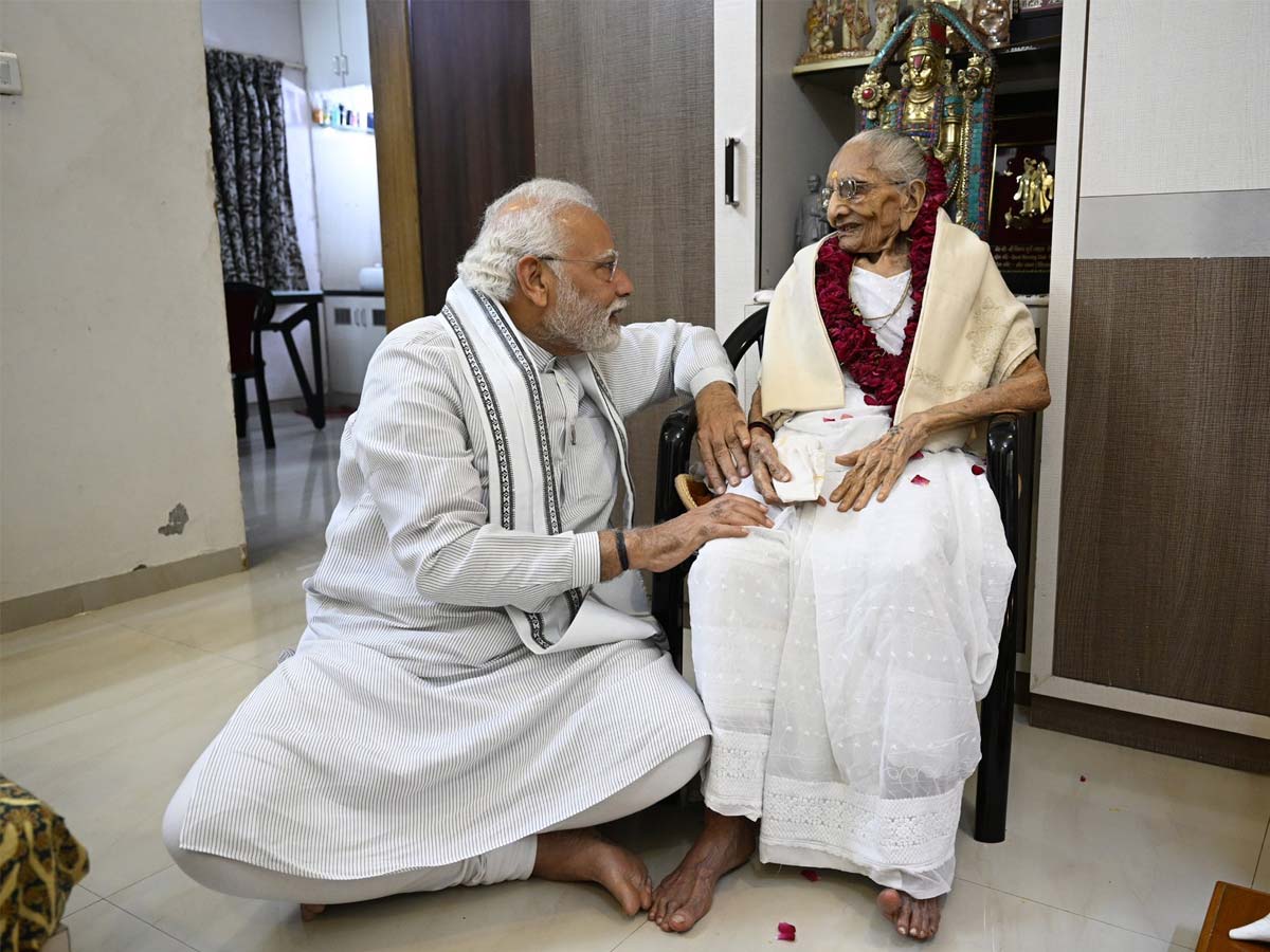 PM Modi takes blessing of his mother on her 100th bday